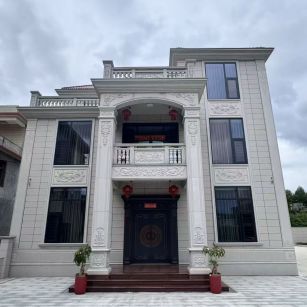 西宁 芝麻白石材别墅干挂案例展示